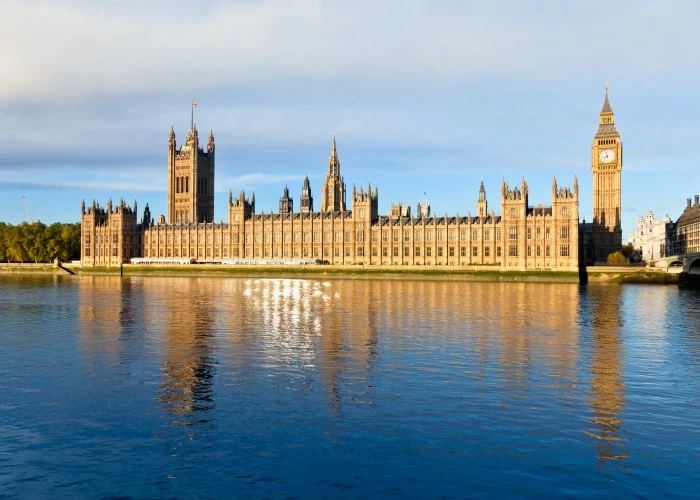 The houses of Parliament in London on a sunny day from across the river Thames