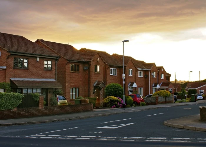 A UK residential street at sunset